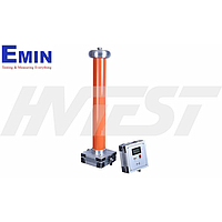 Technician servicing electrical test equipment in an industrial repair environment