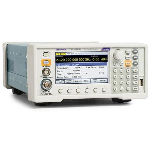 Technician servicing an electronic signal generator in a test and measurement environment